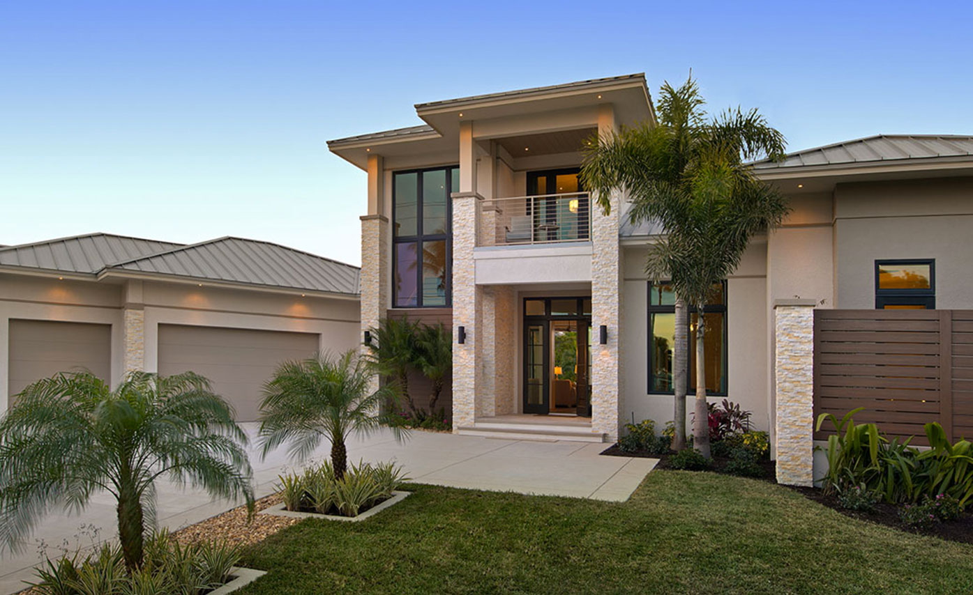 Norstone Ivory Stacked Stone Panels used on columsn and accent walls of large home in Ft. Myers Florida